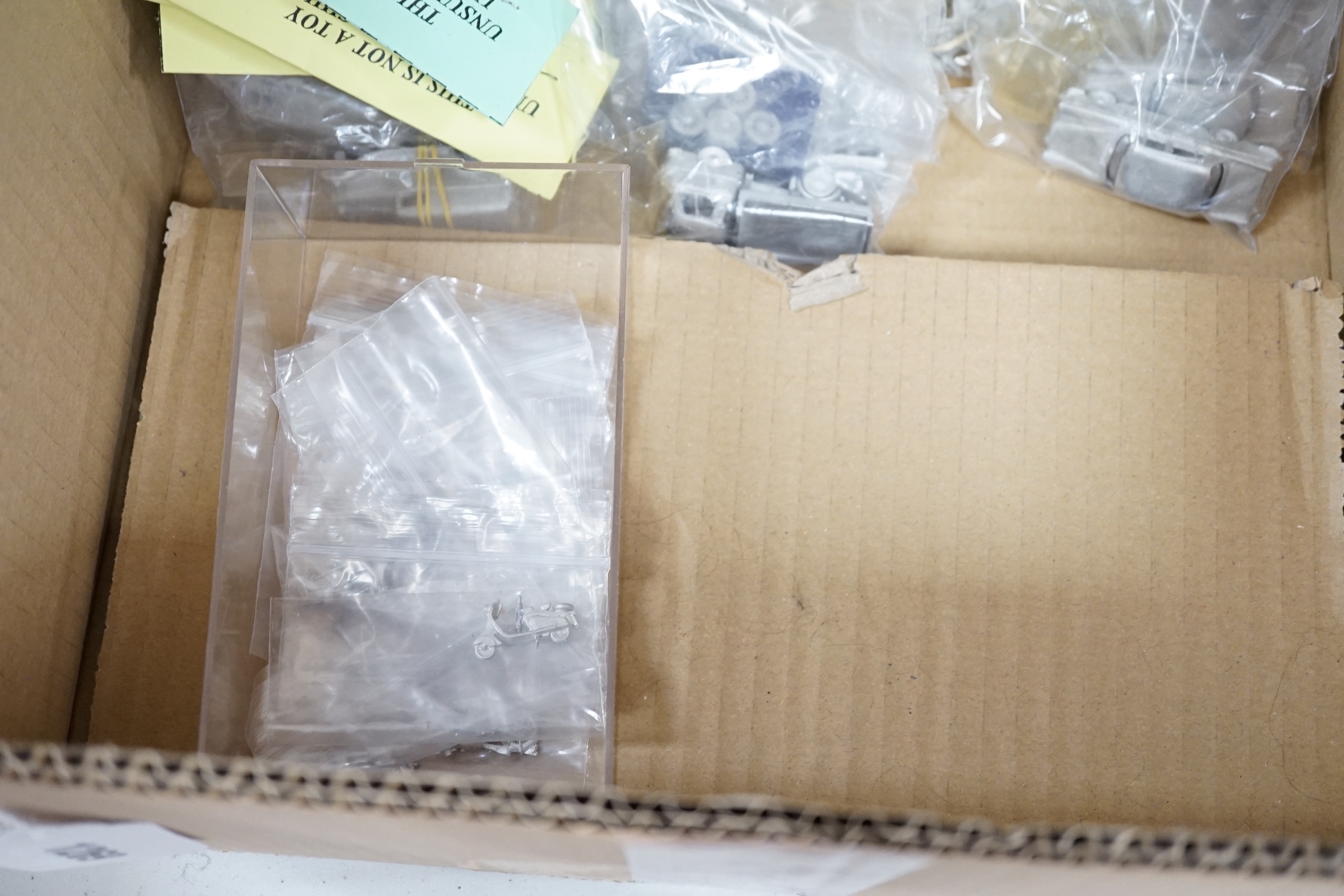Forty 4mm, OO Gauge model railway unconstructed and packeted white metal kits, by Springside Models and R. Parker, including cars, commercial, vehicles, and motorcycles, together with two ratio kits for LMS clerestory co